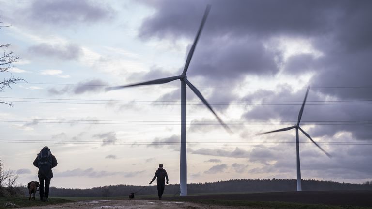 EMBARGOED TO 0001 THURSDAY JUNE 27 File photo dated 21/12/23 of people walking their dogs at Hook Moor Wind Farm, near Leeds. It is "essential" for the UK to generate 100% of its energy from renewable sources, the Scottish Greens have said. As the General Election campaign enters its final week, the party have called for Scotland and the wider UK to aim to power heating, transport and electricity from green sources. Issue date: Thursday June 27, 2024.

