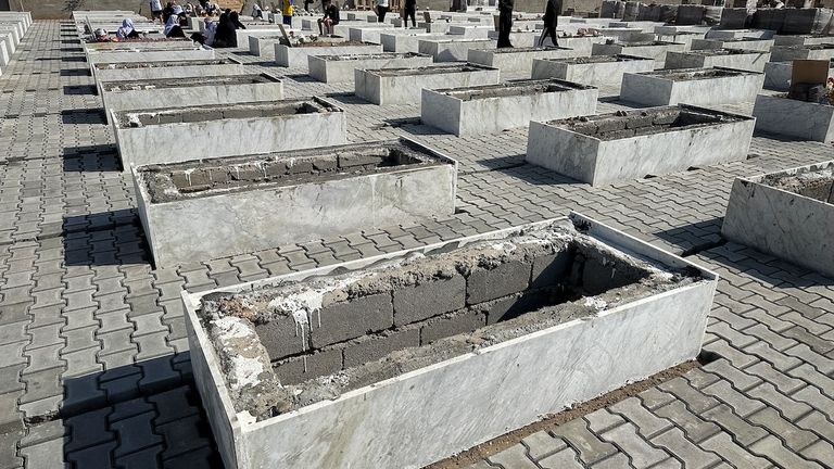 The empty graves of those Yazidi who are still missing in the village of Kocho in Sinjar