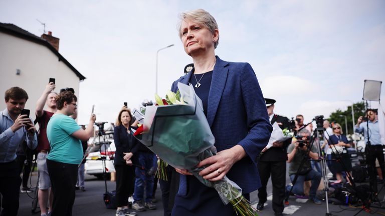 Yvette Cooper near the scene in Hart Street, Southport.
Pic: PA