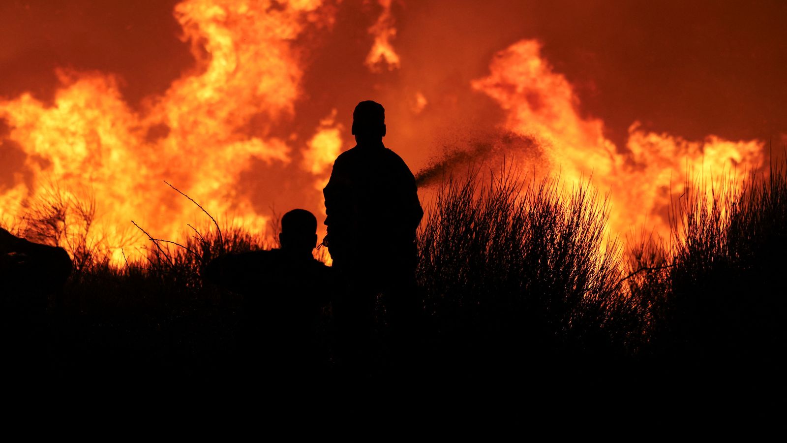 Hospitals evacuated as wildfires spread near Greek capital Athens