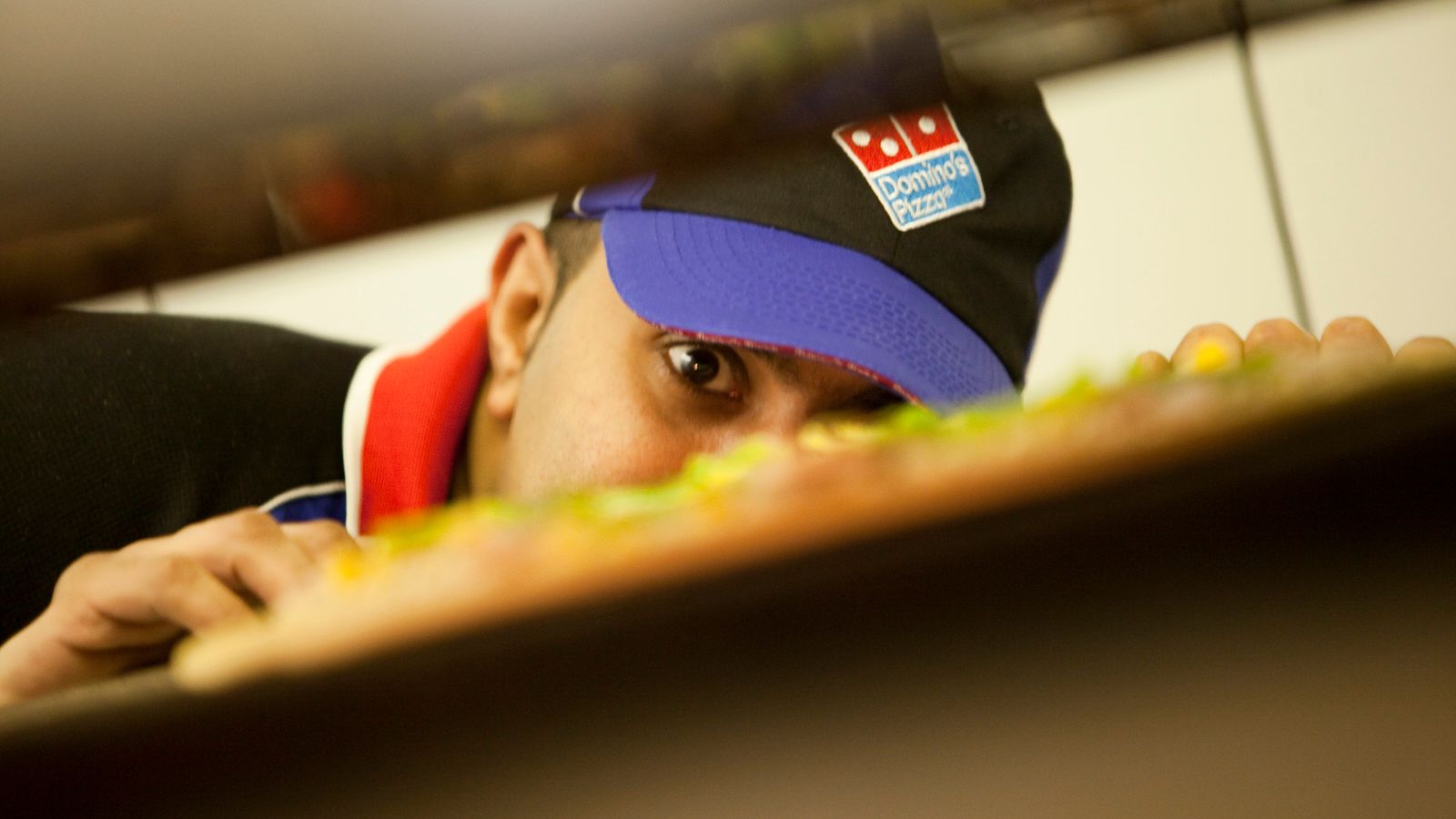 Domino’s cuts average pizza delivery time as it aims to open more UK stores