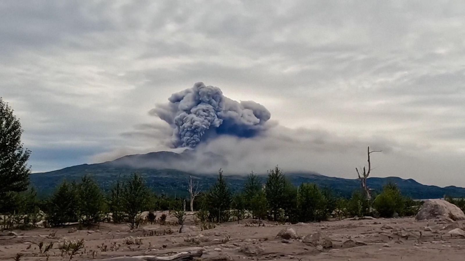 Volcanic eruption and strong earthquake hit Russian coast – Sky News