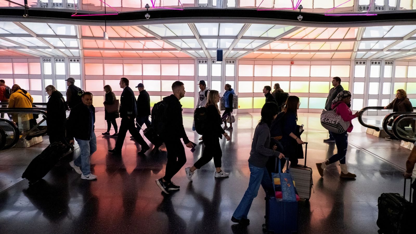 Woman dies after getting stuck in Chicago airport conveyer belt system