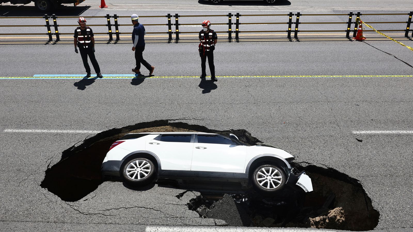 Seoul: Elderly couple injured after their car falls into sinkhole