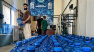Lebanese shopkeepers stockpiling water 
