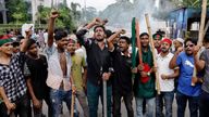 Demonstrators shout slogans after they have occupied a street in Dhaka. Pic: Reuters