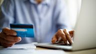 A man pays for something using a credit card online. Pic: iStock