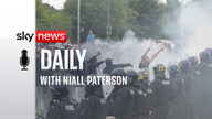 Police officers faced rioters during a protest outside the Holiday Inn Express, housing asylum seekers in Rotherham. 