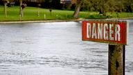 A "Danger" sign is seen on the River Thames, on the day data revealed sewage spills into England's rivers and seas by water companies more than doubled last year, in Hambledon, Britain, March 27, 2024. REUTERS/Dylan Martinez