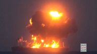 This frame grab from video released by the Ansar Allah Media Office, the media arm of Yemen's Houthi rebels, on Friday, Aug. 23, 2024, shows what the Houthis describe as one of their attacks on the Greek-flagged oil tanker Sounion in the the Red Sea. The logo in the bottom righthand corner of the image reads in Arabic: "Yemeni War Media." (Ansar Allah Media Office via AP)