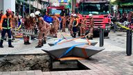 The rescue operation in Kuala Lumpur on Friday. Pic: AP