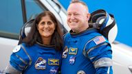 FILE - NASA astronauts Suni Williams, left, and Butch Wilmore stand together for a photo enroute to the launch pad at Space Launch Complex 41 Wednesday, June 5, 2024, in Cape Canaveral, Fla., for their liftoff on the Boeing Starliner capsule to the international space station. (AP Photo/Chris O'Meara, File)