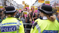 Demonstrators and police officers at an anti-racism protest in Walthamstow. Pic: Reuters