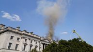 Smoke rises over Somerset House as firefighters work to stop the spread of the blaze. Pic: Reuters