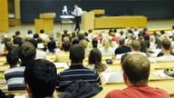 Joachim Grammig, professor of economics addresses his students at the Eberhardt Karl University in Tuebingen, southern Germany on June 24, 2008. (AP Photo/Daniel Maurer,file)