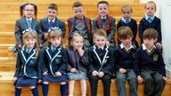 Six sets of twins (left to right, top) Eva-Grace and Greyson McNab, Carter and Greyson Cearns, Demi Rose and Nicole Anne Campbell-Black, (bottom) Ellie Joanne and Hannah Margaret Wilson, Evie and Lukas McGowan, Benjamin and Myles Jones, all due to start the new school term in the Inverclyde area pose for a photograph at St Patrick's Primary School in Greenock, Inverclyde, ahead of the first day at their respective schools. Picture date: Tuesday August 13, 2024.