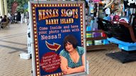 A sign advertising Nessa's slots at the arcade in Barry Island