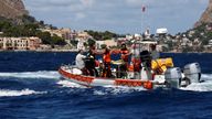 Rescue personnel work at the scene where a luxury yacht sank, off the coast of Porticello, near the Sicilian city of Palermo, Italy, August 20, 2024. REUTERS/Guglielmo Mangiapane