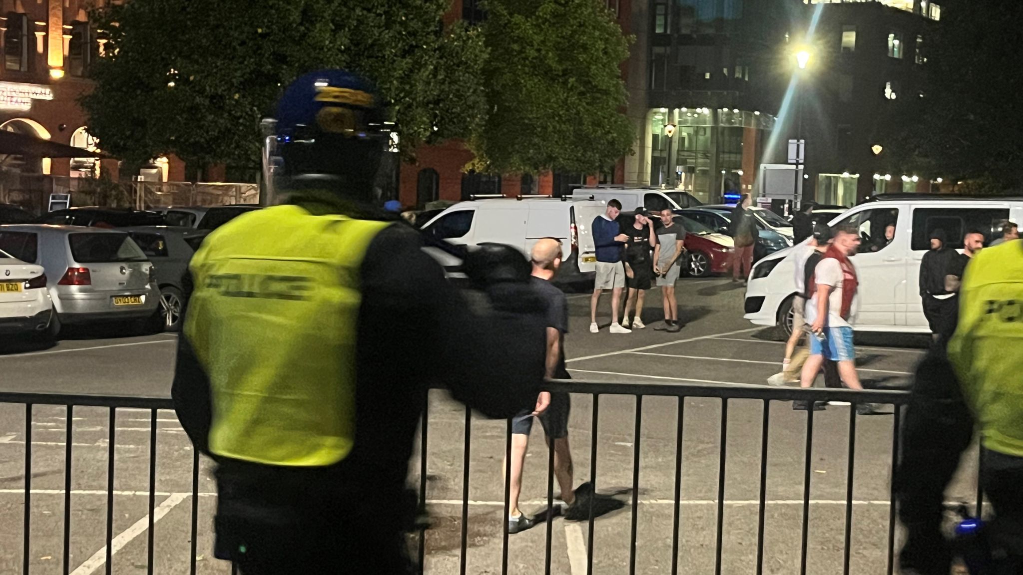 More than 90 arrested after officers injured in violent protests across ...