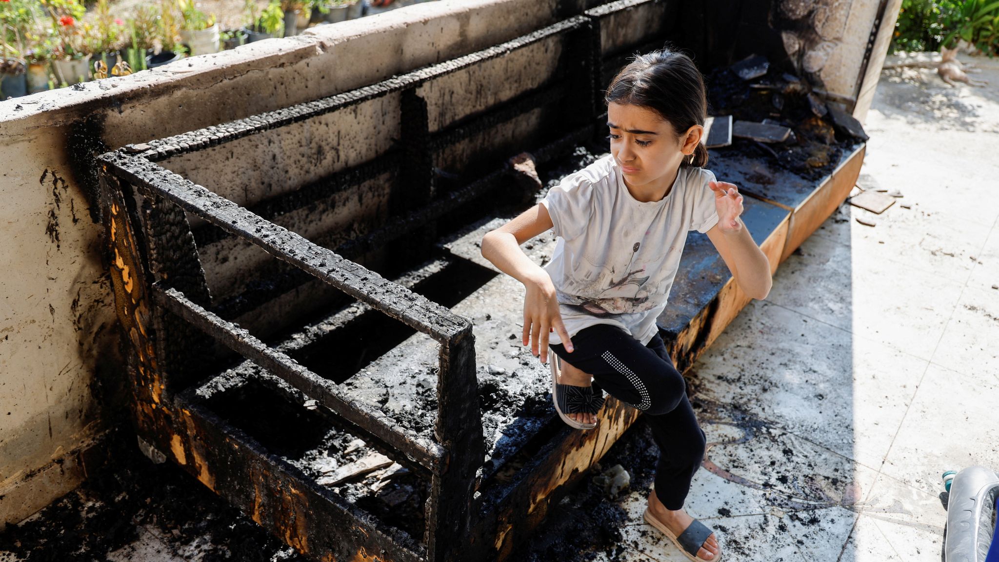 Village set ablaze in West Bank - as Israeli settlers torch homes with ...