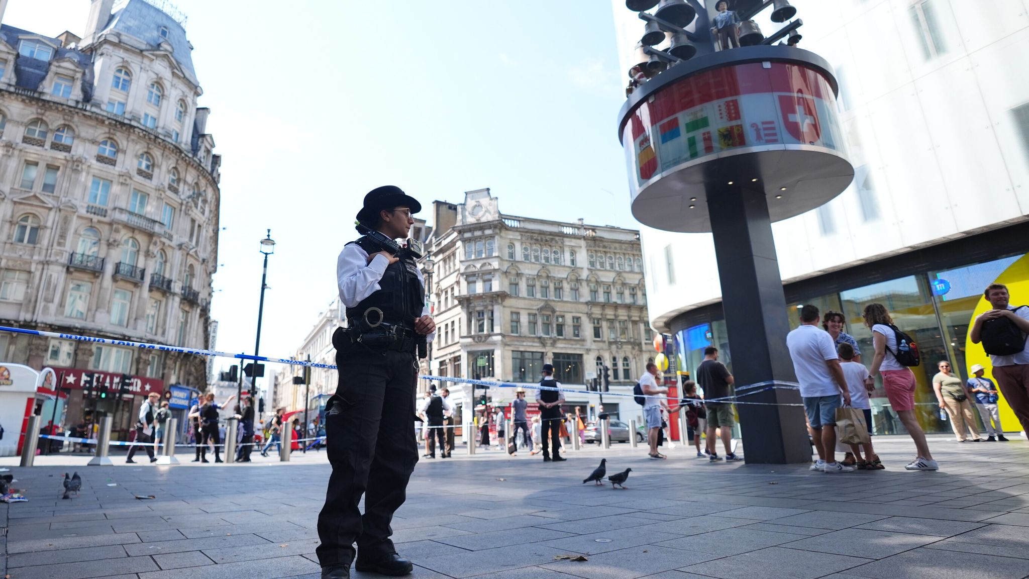 Security guard disarms knifeman after girl, 11, and woman, 34, stabbed in Leicester Square