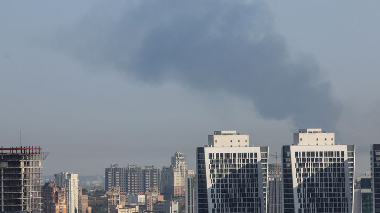 Smoke rises in the sky over the city after a Russian missile strike in Kyiv.
Pic: Reuters