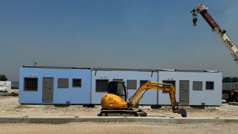 iPhone photo taken by Simone Baglivo at two migrant centres under construction in Albania - this one is in Gjader - north of the Albanian capital, Tirana. The sites are due to be run by Italian officials to process the asylum applications of migrants they have recovered from international waters. Footage taken: 01/08/2024