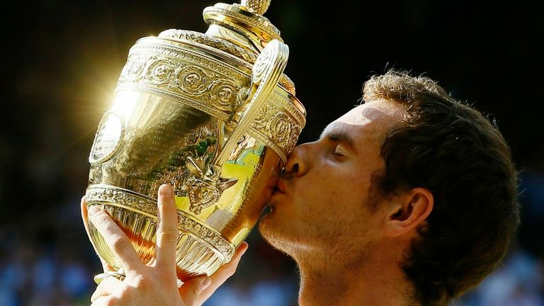 Murray kisses the Wimbledon trophy after winning the tournament for the first time in 2013. Pic: AP