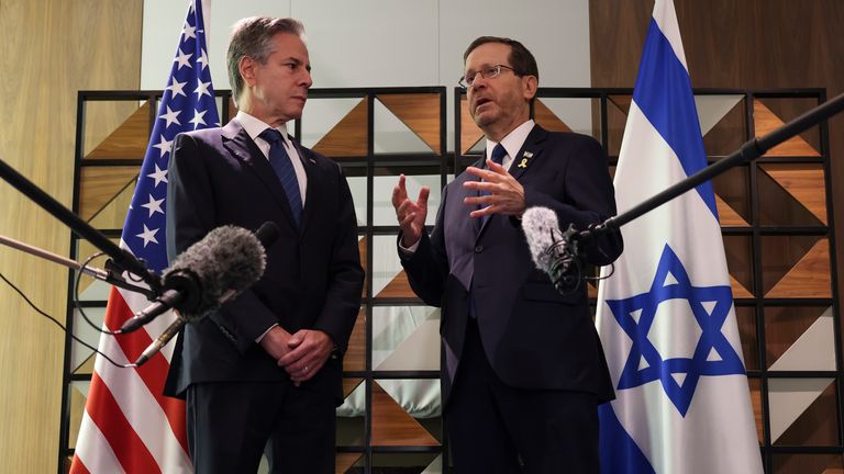 U.S. Secretary of State Antony Blinken, left, meets with Israel's President Isaac Herzog, in Tel Aviv, Israel, Monday, Aug. 19, 2024. (Kevin Mohatt/Pool Photo via AP)