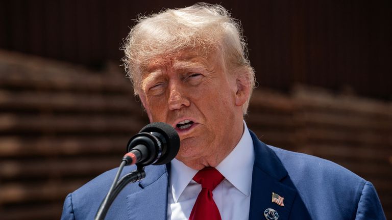 Republican presidential nominee and former U.S. President Donald Trump visits the frontier with Mexico in Cochise County, Arizona, U.S. August 22, 2024. REUTERS/Go Nakamura
