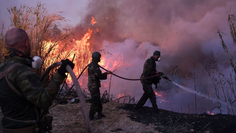 Mega wildfires, like the blaze this month near Athens, are becoming more common due to climate change, scientists have found. Pic: AP