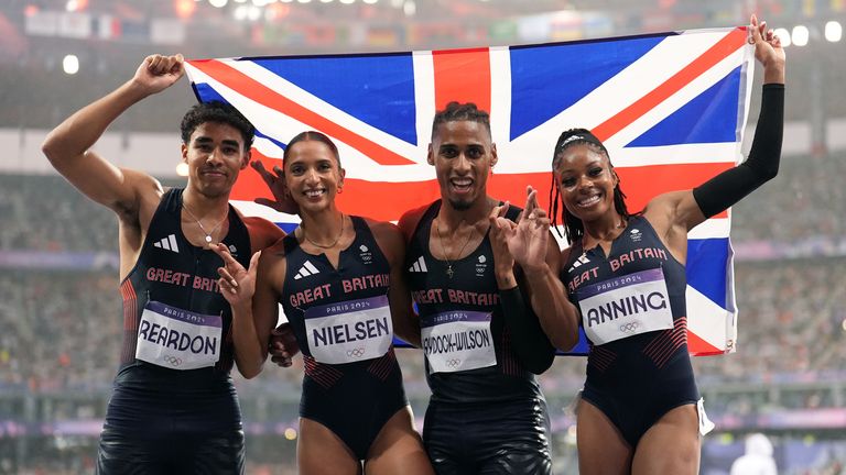 Sam Reardon, Laviai Nielsen, Alex Haydock-Wilson and Amber Anning celebrate after winning a bronze medal. Pic: PA