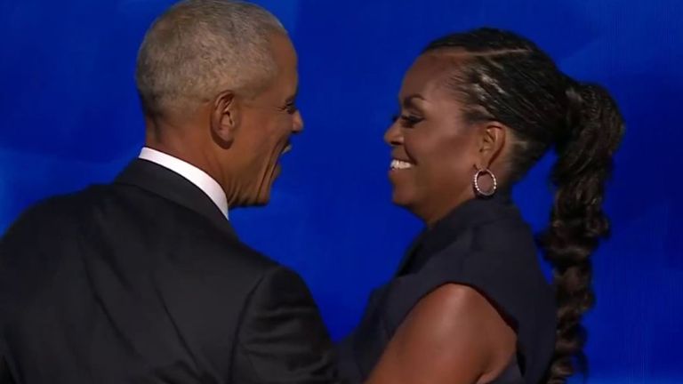 Barack and Michelle Obama appear on stage at the Democratic National Convention