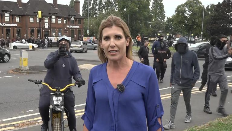 Birmingham: Protesters surround Sky correspondent and slash tyre amid unrest  | News UK Video News | Sky News