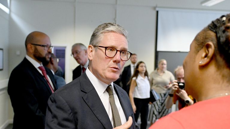 Keir Starmer talks to staff during a visit to Police Service of Northern Ireland (PSNI) training college at Garnerville in Belfast.
Pic: PA
