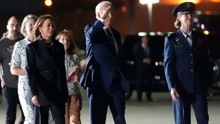 President Biden and Kamala Harris greeted the trio.  AP Image