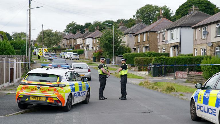 Emergency services in Westbury Road, Bradford, following a house fire where four people, including three children, died. Two girls aged nine and one, and a five-year-old boy, were taken to hospital but all died from their injuries, while a 29-year-old woman also died at the scene. Police believe the fire was started deliberately and the incident was domestic-related. A man has been arrested on suspicion of murder. Picture date: Wednesday August 21, 2024.