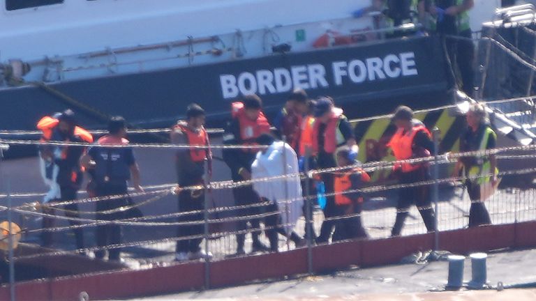 Migrants being brought to Dover by Border Force after trying to cross the Channel in small boats in August. Pic: PA