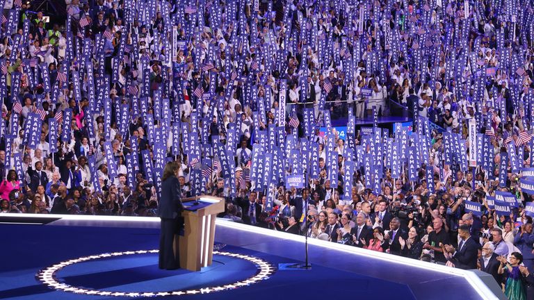 Democratic presidential nominee and U.S. Vice President Kamala Harris takes the stage on Day 4 of the Democratic National Convention (DNC) at the United Center in Chicago, Illinois, U.S., August 22, 2024. REUTERS/Mike Blake
