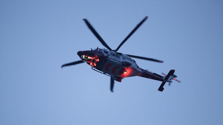 A Coastguard helicopter flies over St Thomas' Hospital in Westminster, London, to salute local heroes during Thursday's nationwide Clap for Carers NHS initiative to applaud NHS workers fighting the coronavirus pandemic.