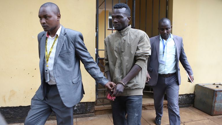 Prime suspect, Collins Jumaisi Khalusha, leaves court in Nairobi, Kenya, Tuesday, July 16, 2024. The court has allowed police to detain Khalusha, for 30 days as the prime suspect of killing and dismembering women then dumping them in a flooded quarry. (AP Photo/Andrew Kasuku)