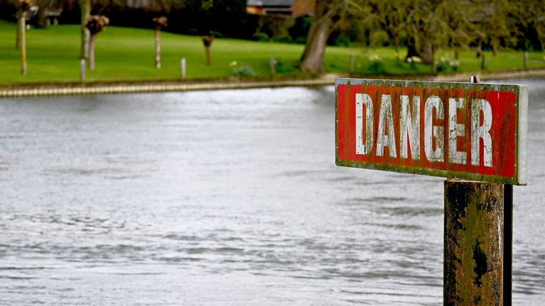 A "Danger" The sign is seen on the River Thames, on the day data showed that wastewater discharges from water companies into England's rivers and seas have more than doubled in the last year, in Hambledon, Britain, March 27, 2024. REUTERS/Dylan Martinez