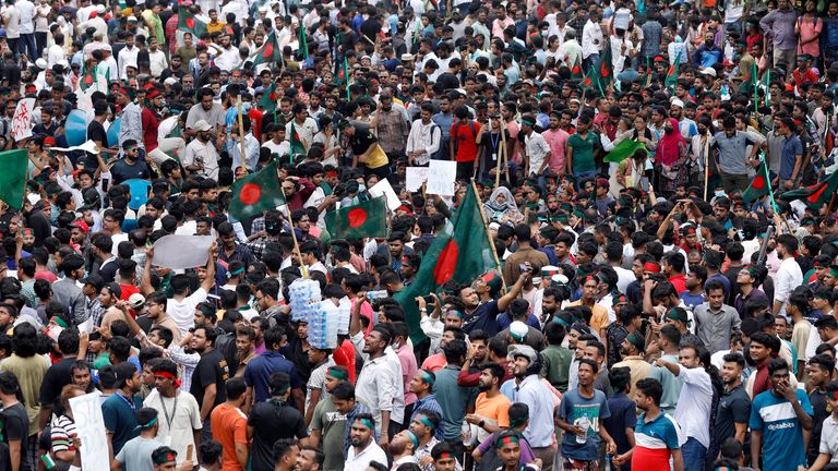 People participate in a rally against Prime Minister Sheikh Hasina and her government demanding justice for the victims killed in the recent countrywide deadly clashes, in Dhaka, Bangladesh, Sunday, Aug. 4, 2024. (AP Photo/Rajib Dhar)