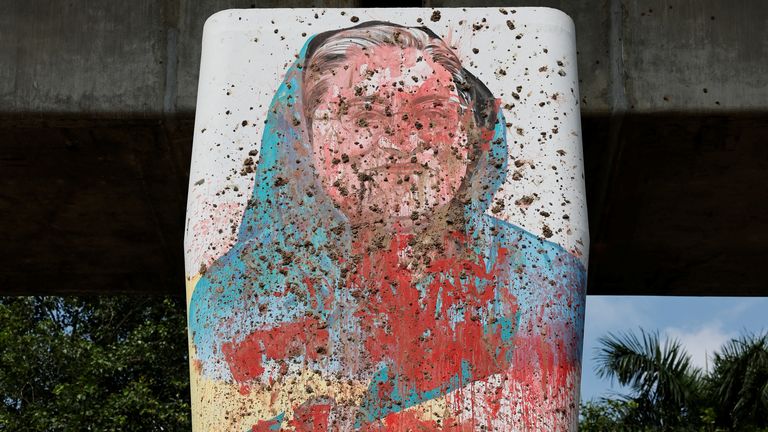 A mural of Sheikh Hasina vandalised by protesters in Dhaka. Pic: Reuters