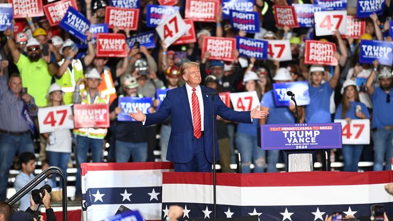 Republican presidential nominee former President Donald Trump takes the stage during a campaign event in Johnstown, Pa., Friday, Aug. 30, 2024. (The Tribune-Democrat via AP)