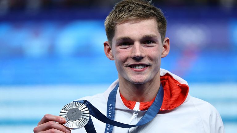 Silver medallist Duncan Scott of Britain poses with his medal. Pic: Reuters