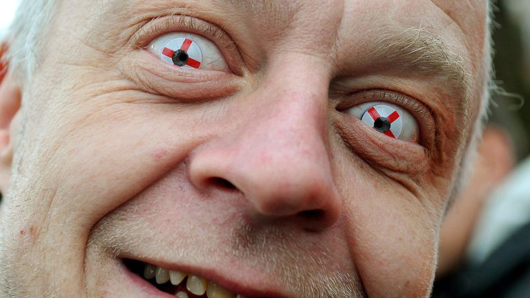 A member of English Defence League wears his patriotic contact lenses before the march into St George's Square, Luton in 2011