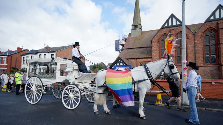 The horse-drawn carriage that carried the coffin of Elsie Dot Stancombe waits outside St John's Church in Birkdale.
Pic: PA