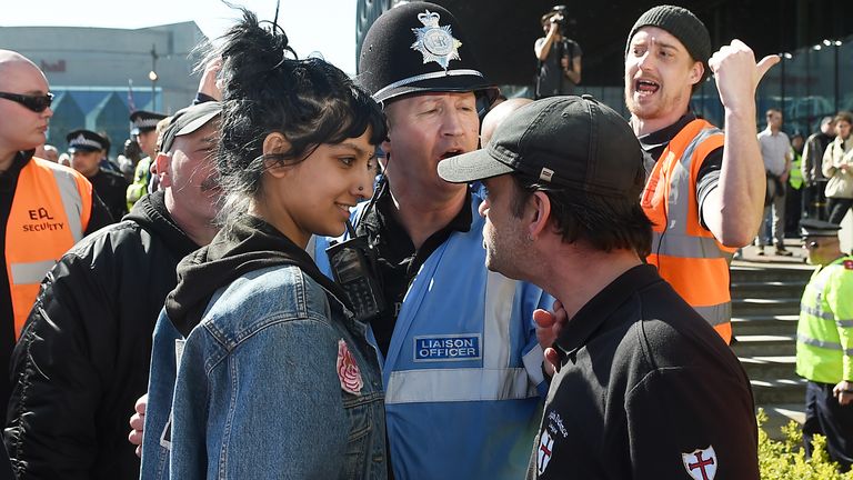 Saffiyah Khan faces down English Defence League (EDL) protester Ian Crossland during a demonstration in the city of Birmingham, in the wake of the Westminster terror attack in 2017