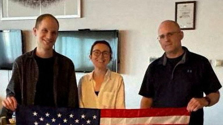 Evan Gershkovich, Alsu Kurmasheva and Paul Whelan celebrate their freedom. Pic: US Government/Reuters
